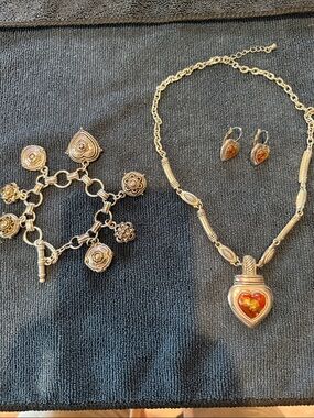 Heard shaped necklace and matching earrings, bracelet, Briton .